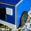 Blue play Truck on snowy ground.