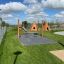 wooden wigwams on the public playground