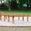 Hip Hop wooden balance beams on playground sand surface