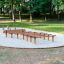 Hip Hop playground wooden climbing and balancing structure on sand surface.