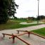 Easy Balancer outdoor wooden balancing beams in park.