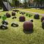 Jumping pegs (5 pcs.) on a playground obstacle course with tires and spheres