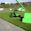 Green Lounge chair in a playground.