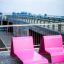 Pink Lounge chair by the pier