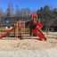 wooden tower with slides for playground