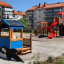 larch wooden playground set with slides