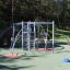 Metal playground equipment Sirius steel structure in a park setting.