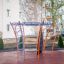 Steel climbing structure for children in a playground, named Andromeda.