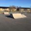 Double Quarter-Pipe in a skatepark on a sunny day