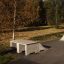 Double Quarter-Pipe skate ramp in an outdoor park setting.