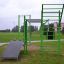 Outdoor fitness equipment New Age Fit MEDIUM in a park setting.
