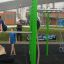 Children playing on the New Age Fit MEDIUM outdoor fitness structure.