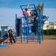 Children playing on New Age Fit MEDIUM playground equipment.