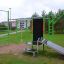 Outdoor fitness equipment New Age Fit MEDIUM in a park setting.