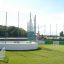 Multiarena sports facility with soccer goals on artificial turf.