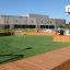 Multiarena for sports activities with football goal and basketball hoop.