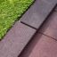 Rubber Tiles 55 edging and safety surface next to artificial grass.
