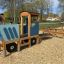 Wooden playground Tractor with trailer for kids.