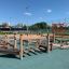 Outdoor playground equipment Poison Ground designed for children with multiple wooden structures and