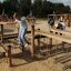 Big wooden playground for children with many climbing elements, nets,ladders and Play Sets