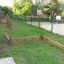 Outdoor wooden balance playground equipment.