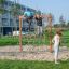 wooden climbing frame with monkey bars