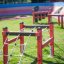 Trapezoidal wooden playground climbing structure for children.