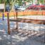Chain Bridge play structure in a playground with sand