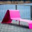 Pink Lounge Sofa by the water.