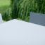 Table & Bench Quadro HPL in a green outdoor setting.