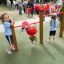 Kids playing on the wooden Samersault.