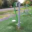 Outdoor Leg Press exercise equipment in a park.