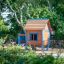 blue wooden playhouse in the park