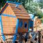 blue playhouse for outdoor playgrounds