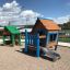 wooden playhouses on the outdoor playground